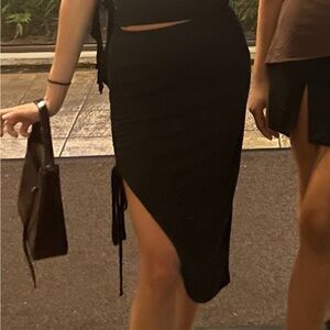 Black midi skirt with slit